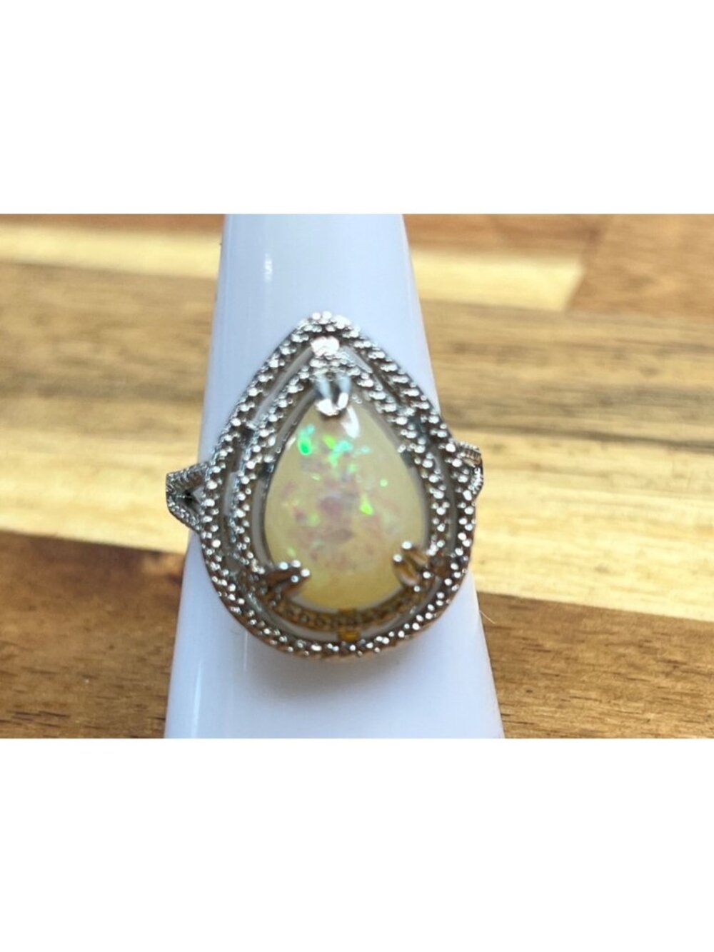 Artisan inspired handcrafted .925 sterling silver ring with pear shape opal